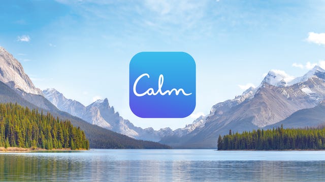 Calm app logo in front of mountains and lake